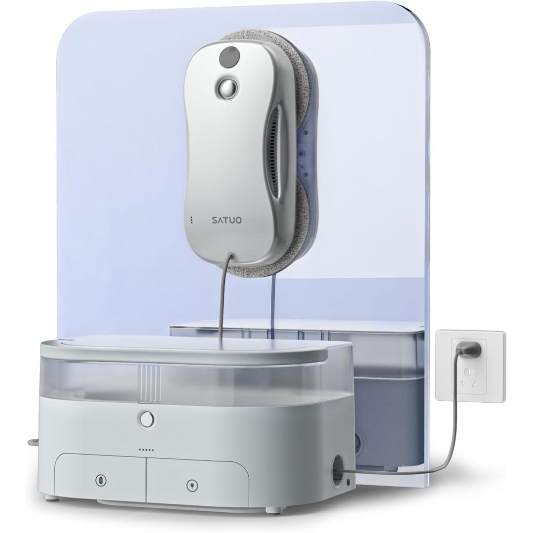 Robot lave vitres avec station alliant le deplacement sur la vitre et le nettoyage des surfaces vitrees